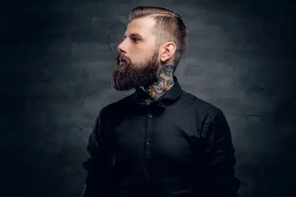 depositphotos 126592590 stock photo bearded hipster male with tattoo